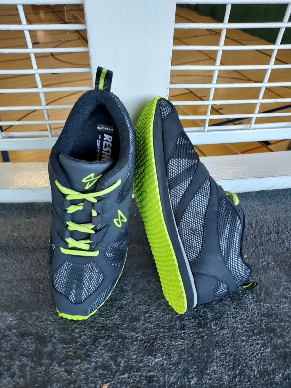 Reshod Walking Shoe Pushover with black upper and lime green lace and outsole