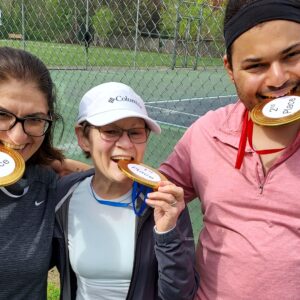 Top 3 winners of the race, wearing their chocolate medals.
